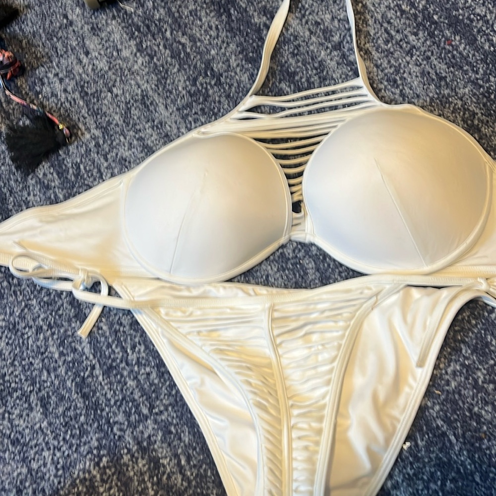 Victoria’s Secret white sexy string bikini with string embellishments.